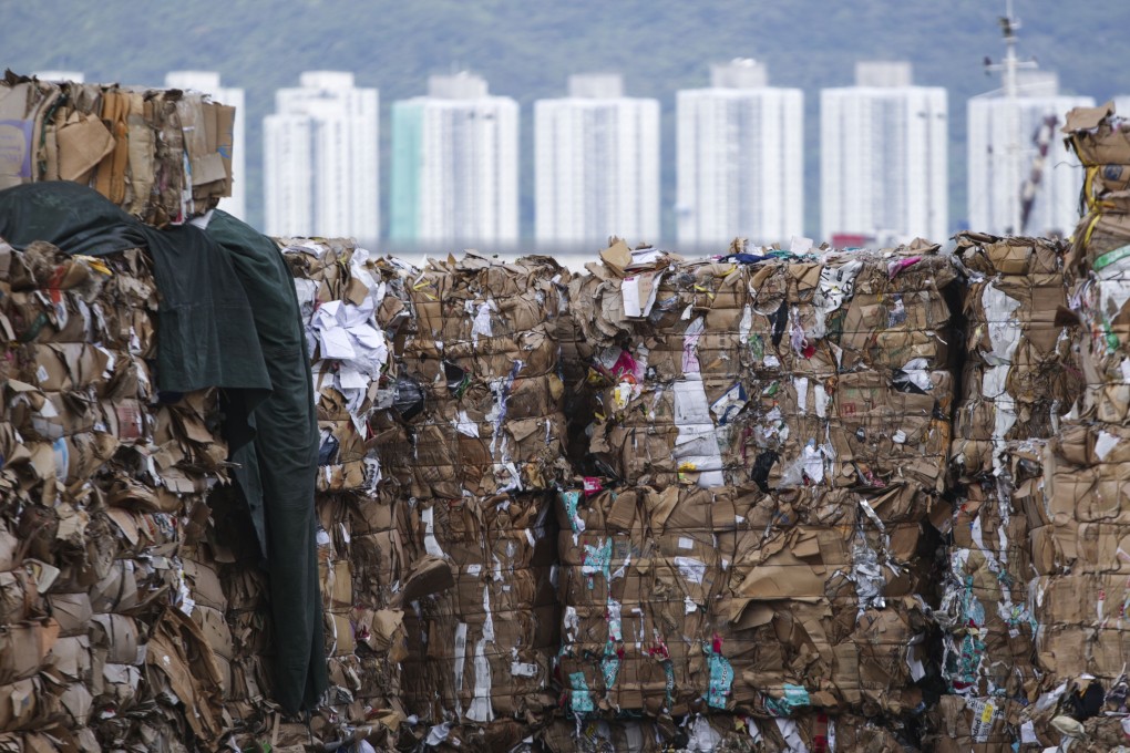 Piles of waste paper sit in Tsuen Wan, organised for shipment to processing plants or landfills. Hong Kong is grappling with a recycling problem, brought on by changing mainland policies, limited resources and competition. Photo: Sam Tsang