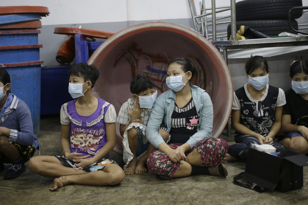 Child labourers found working at a shrimp shed during a raid in Samut Sakhon, Thailand. Photo: AP