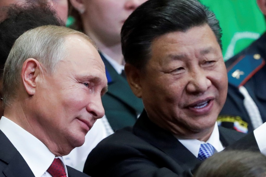 Vladimir Putin and Xi Jinping pictured in Vladivostok last year. Photo: Reuters