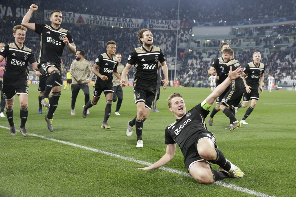 Ajax captain Matthijs de Ligt leads his teammates in celebrating beating Juventus. Photo: AP