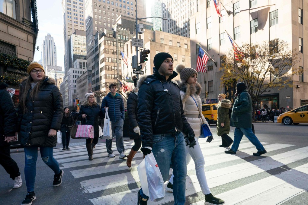 Shoppers in the US are discovering better deals thanks to low global interest rates, yet inflation still looks like a distant problem. Photo: AFP