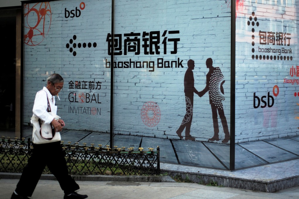 Although the People’s Bank of China has said it was not planning any more seizures after taking over Baoshang Bank on May 24, analysts see the move as a precursor to sector consolidation. Photo: Reuters