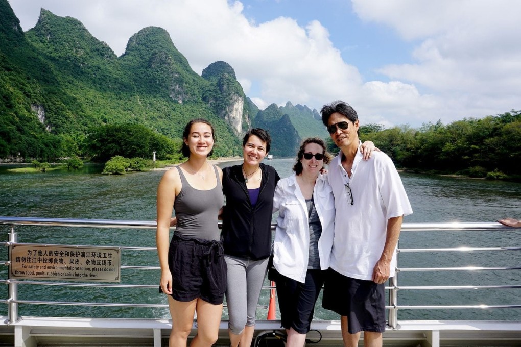 Taking on the challenge of travelling with adult children: the Chang family (from left) Sara, Rachel, Elizabeth and Darryl during a cruise down the Li River from Guilin to Yangshuo. Photo: Washington Post/Chang family