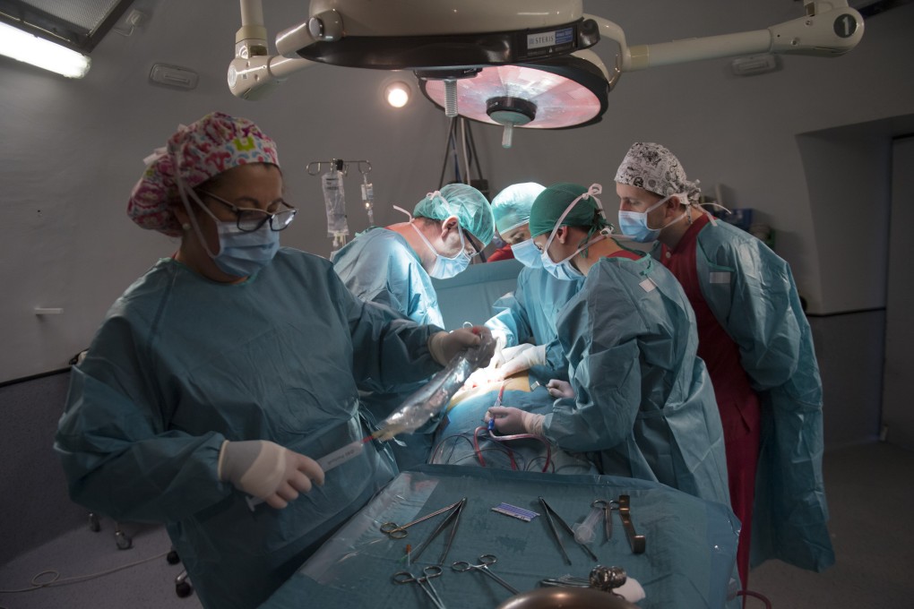 Surgeons perform a renal transplantation at a hospital in Madrid, Spain. There are plenty of high-calibre medical schools outside Asia where would-be doctors can pursue their dreams. Photo: AFP