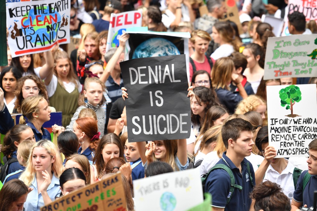 Thousands of students assemble at Sydney’s town hall, joining the global “climate strike” to demand urgent action on climate change, on March 15. Photo: EPA-EFE
