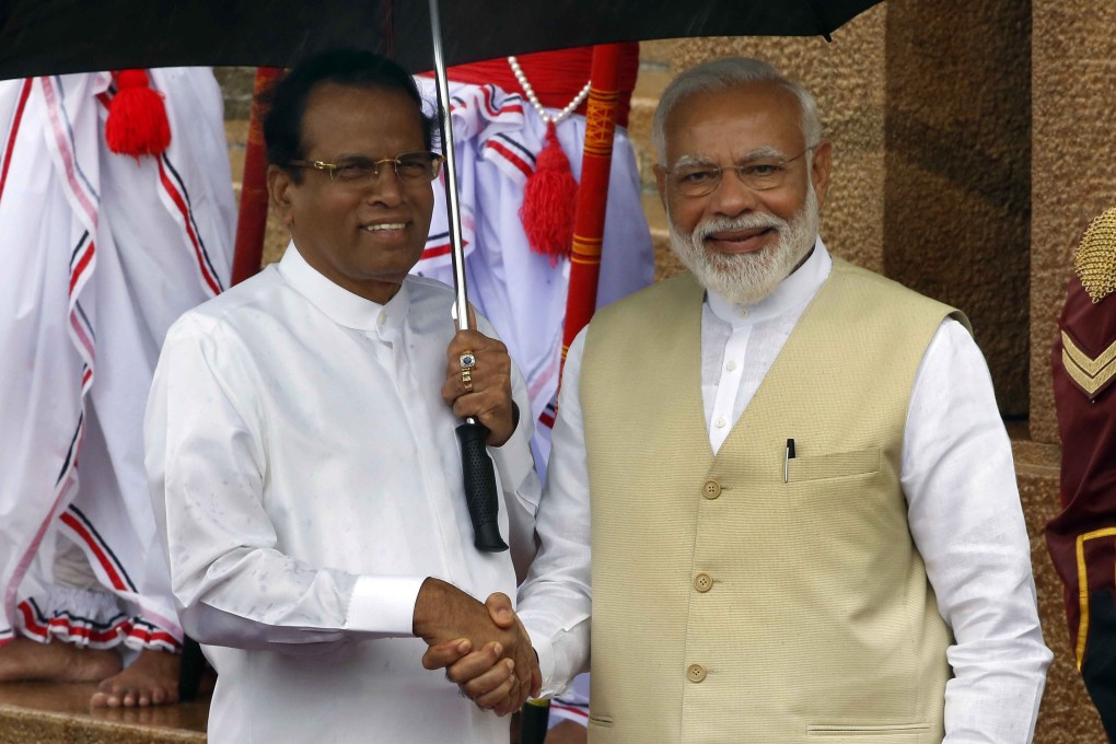 Sri Lankan President Maithripala Sirisena (left) welcomes visiting Indian Prime Minister Narendra Modi. Photo: EPA-EFE