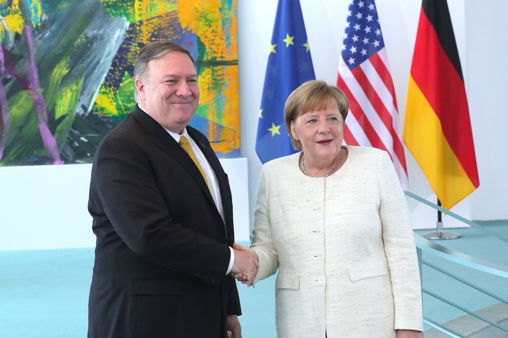 US Secretary of State Mike Pompeo with Germany’s chancellor, Angela Merkel, in Berlin last month. Photo: Bloomberg
