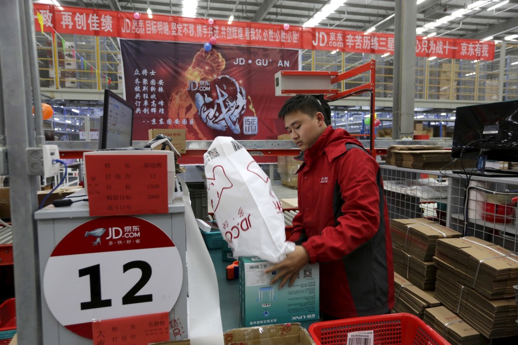 An employee works at a JD.com logistics centre in Langfang, in China’s Hebei province, in November 2015. ESR Cayman is one of JD’s major landlords in the Asia-Pacific region. Photo: Reuters