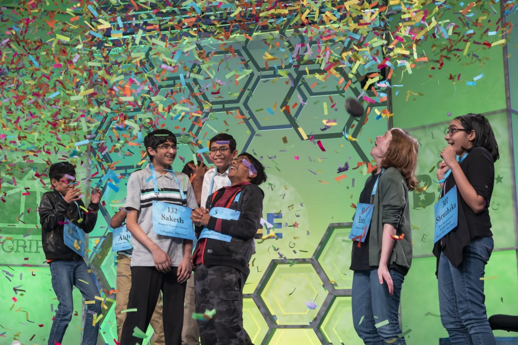 The eight champions celebrate after winning the 2019 Scripps National Spelling Bee contest. Photo: EPA
