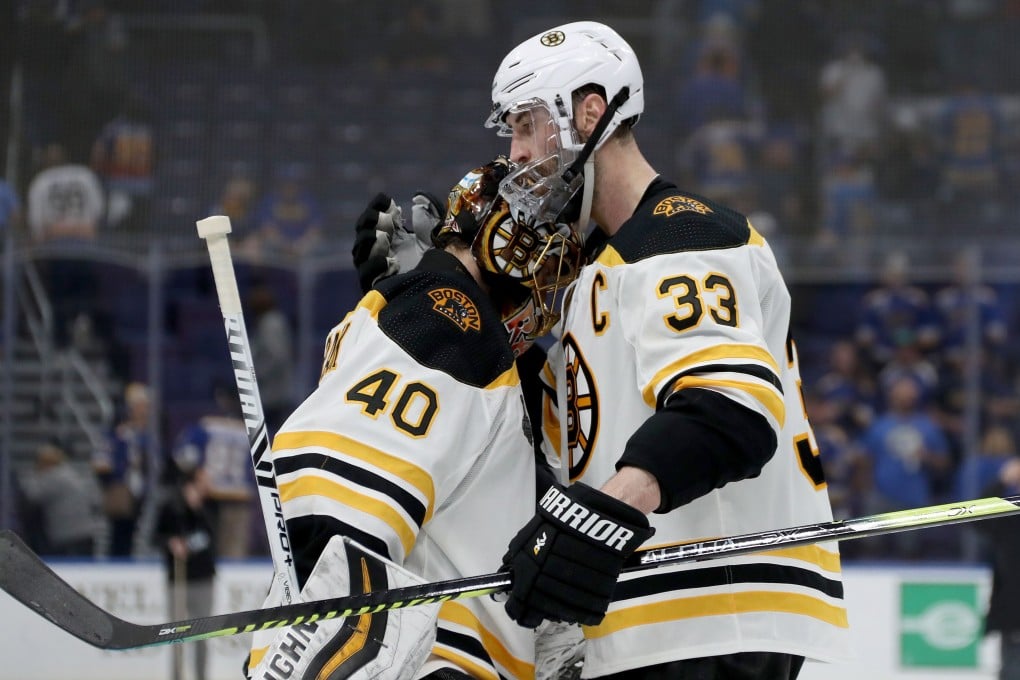 Tuukka Rask and Zdeno Chara, who has been playing with a broken jaw, of the Boston Bruins celebrate their teams 5-1 win over the St Louis Blues in Game Six of the 2019 NHL Stanley Cup Final. Photo: AFP