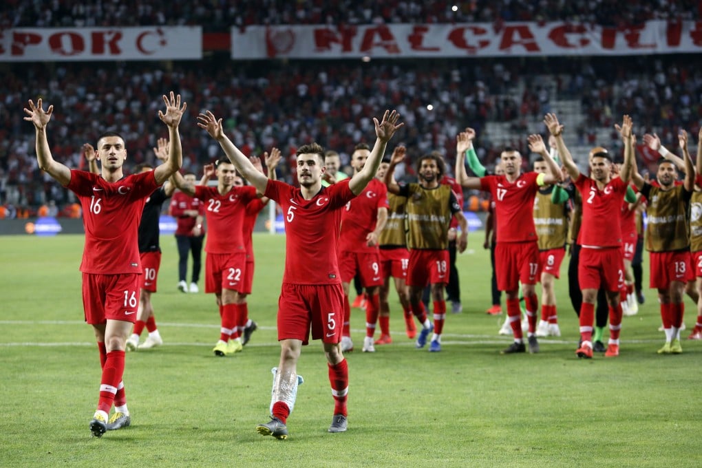 Turkey players celebrate winning their Uefa Euro 2020 qualifier against France in Konya. Photo: Xinhua