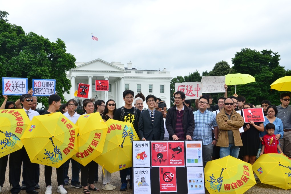 Dozens of people protested against Hong Kong's extradition bill outside the White House in Washington on Sunday. Photo: SCMP / Nectar Gan