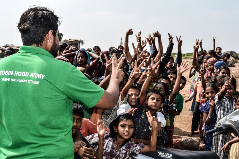 Robin Hood Army distributes clothes before Diwali. Photo: courtesy Barish Bose