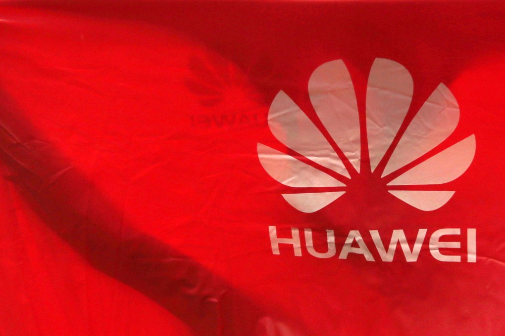 The Huawei logo is seen on a raincoat in Phnom Penh, Cambodia, on June 6. The company told the UK on Monday that it was under no obligation to spy for the Chinese state. Photo: EPA-EFE