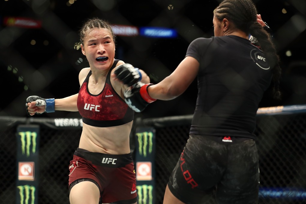 Zhang Weili punches Danielle Taylor in their featherweight bout at UFC 227 in Los Angeles. Photo: AFP