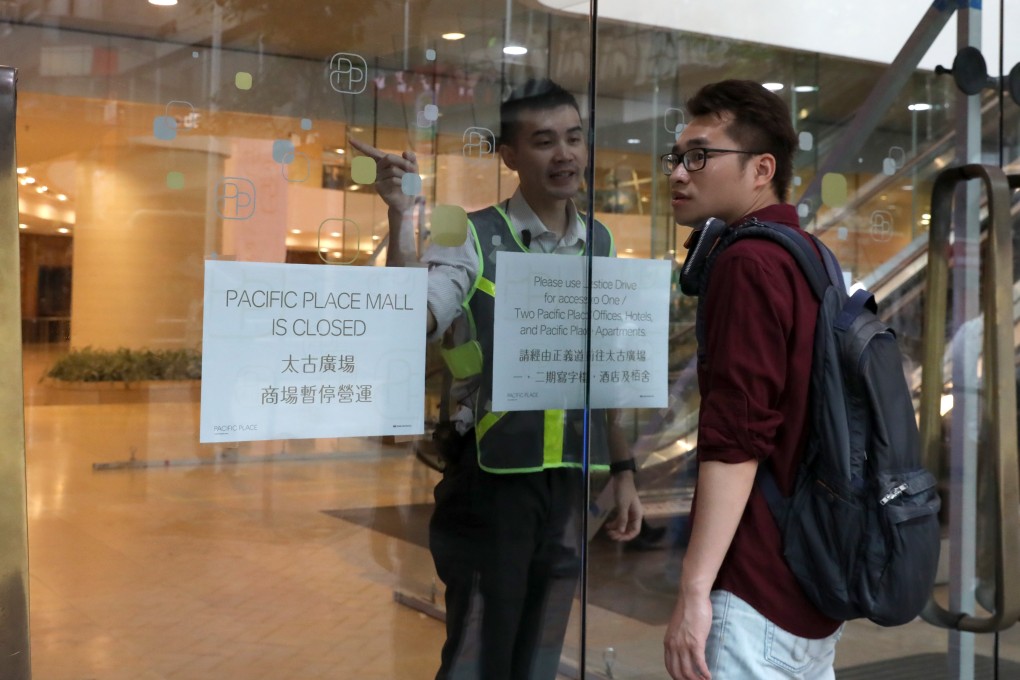 Pacific Place was closed to shoppers on Thursday morning, but its hotels and two office towers continued to operate. Photo: K.Y. Cheng