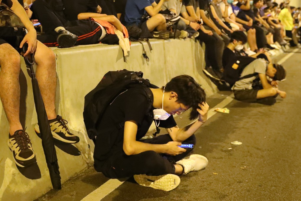 Smartphones running apps such as Telegram have offered protesters a way to communicate with each other that was not as prevalent under 2014’s umbrella movement. Photo: Edmond So