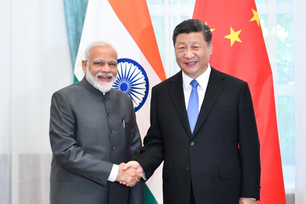 Chinese President Xi Jinping and Indian Prime Minister Narendra Modi meet at the Shanghai Cooperation Organisation in Kyrgyzstan. Photo: Xinhua