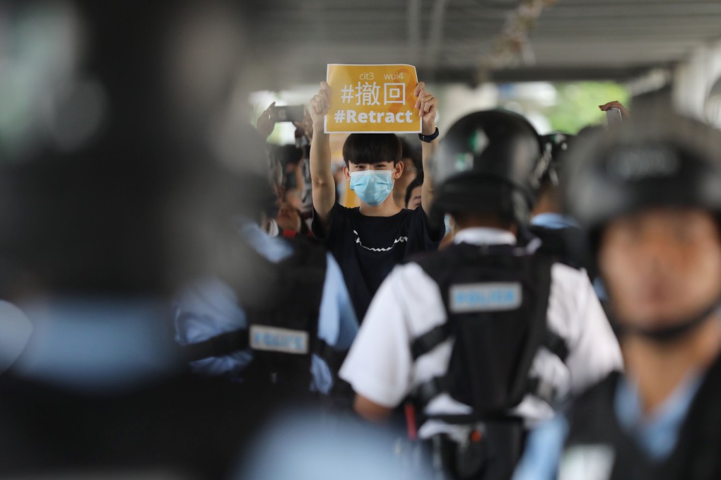 At least 100 protesters gathered on the footbridge outside the United Centre in Admiralty on Thursday. Photo: Sam Tsang