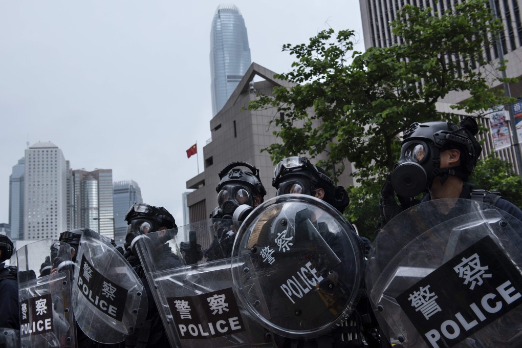 Police officers prepare to disperse a protest against the extradition bill in Hong Kong on June 12. As the China-US economic cold war escalates, and rising regulatory hurdles make it harder for Chinese companies to raise capital in the US, Hong Kong will become immensely valuable to China as an offshore financial centre. Photo: DPA