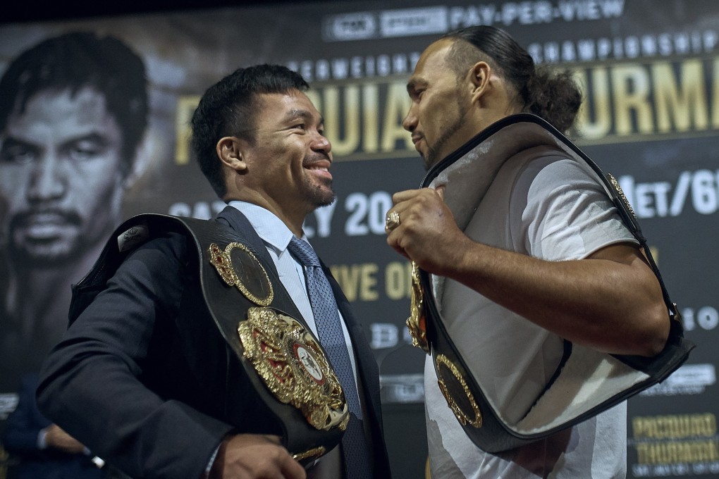 Manny Pacquiao and Keith Thurman stand face to face during a news conference to promote their July 20 fight in Las Vegas. Photo: AP