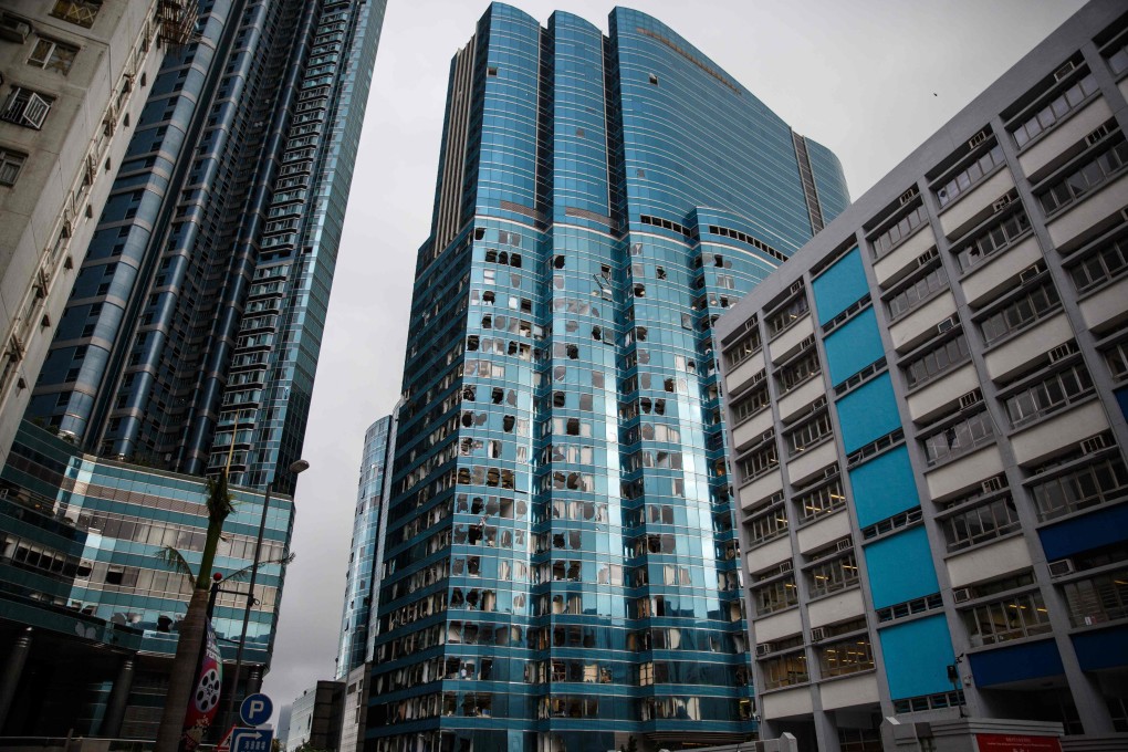 A harbourside commercial building had its windows blown out when Super Typhoon Mangkhut made landfall in Hong Kong on September 16, 2018. Flooded homes, damaged infrastructure, disrupted supply chains and higher insurance premiums are some of the effects of climate change we need to plan for. Photo: AFP