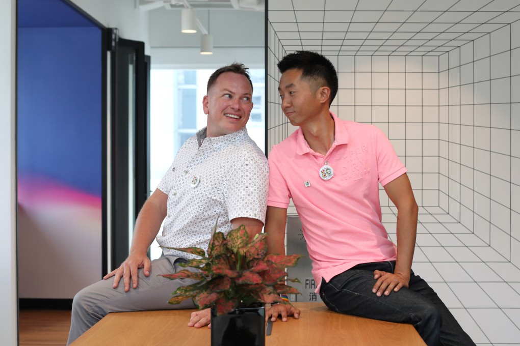 Senior immigration officer Angus Leung (right) and his husband Scott Adams. The Court of Final Appeal unanimously ruled in favour of Leung, granting the couple spousal benefits and joint tax assessment enjoyed by heterosexual couples in the city. Photo: Xiaomei Chen