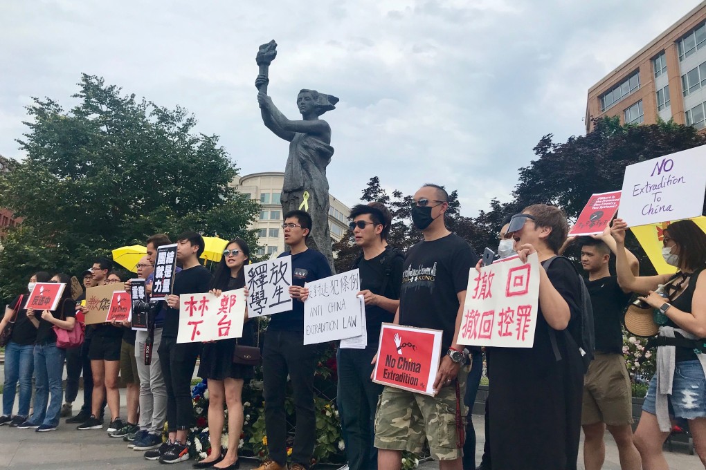 Demonstrators gathered around the Victims of Communism Memorial in Washington on Sunday. Photo: Nectar Gan
