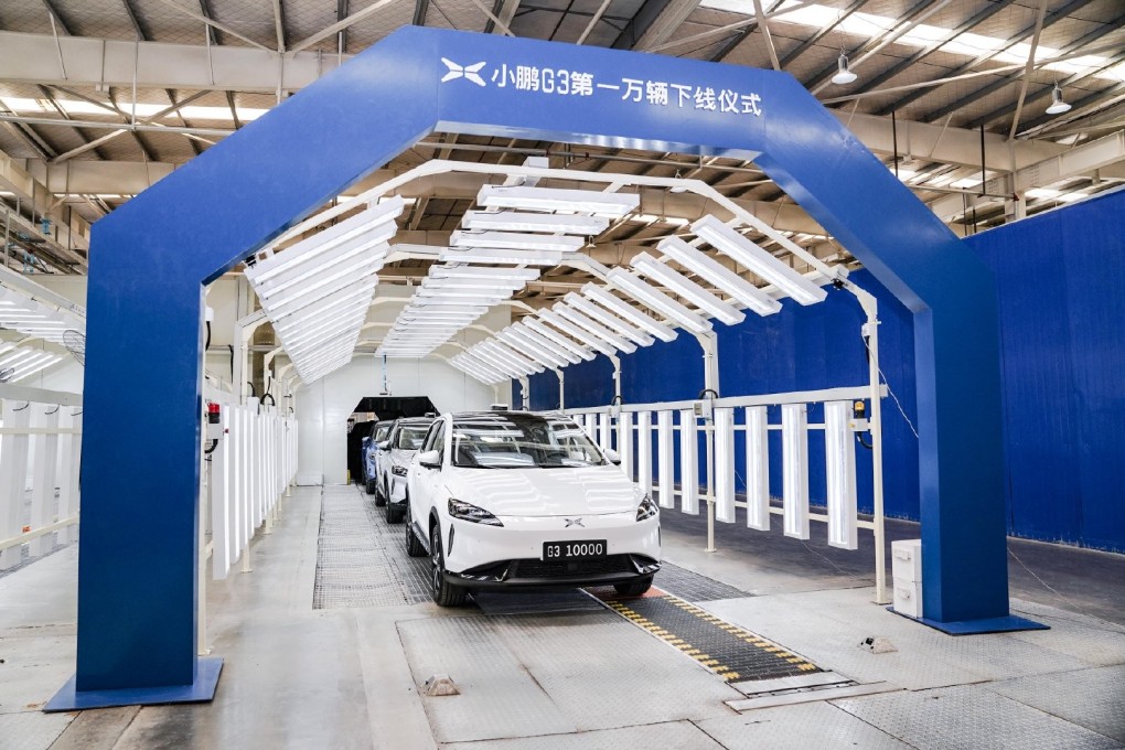 The 10,000th unit of Xpeng’s G3 all-electric sports-utility vehicle rolls off the carmaker’s contract manufacturer Haima Automobile Group in the Henan provincial capital of Zhengzhou on June 18, 2019. Photo: SCMP/Handout
