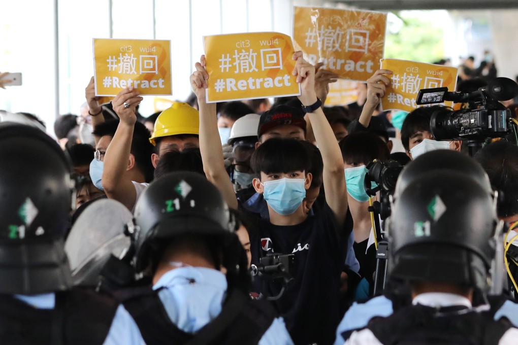 Anti-extradition bill demonstrators send out a message to the administration, on a footbridge in Admiralty on June 13. Photo: Sam Tsang