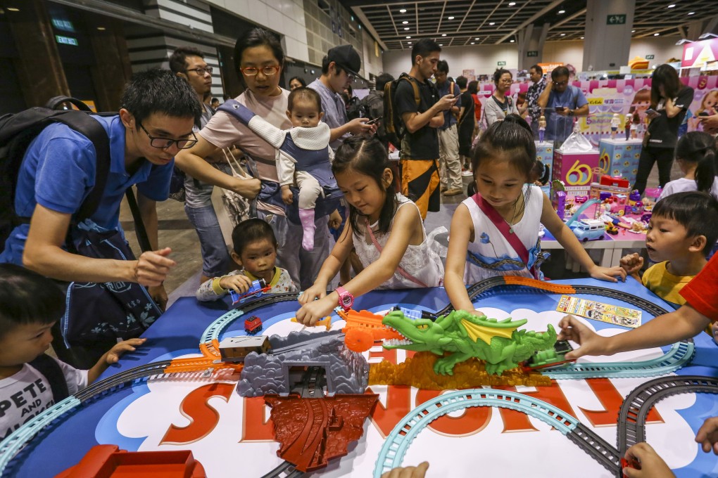 Children play at the Hong Kong Toy Festival in Wan Chai on June 16. The spirited nature of Hongkongers is essential to the city’s economic survival. Photo: Jonathan Wong