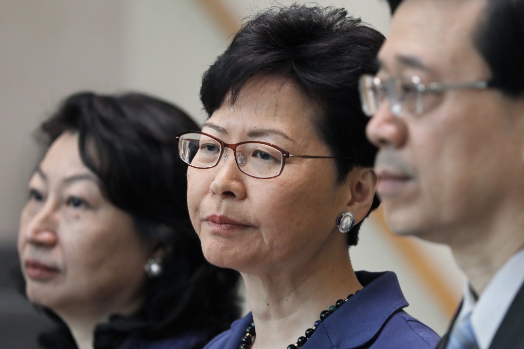 Anti-extradition bill protesters want not just Chief Executive Carrie Lam Cheng Yuet-ngor (centre) to resign, but also her unpopular secretary for justice, Teresa Cheng Yeuk-wah (left), and security chief John Lee Ka-chiu (right). Photo: AP