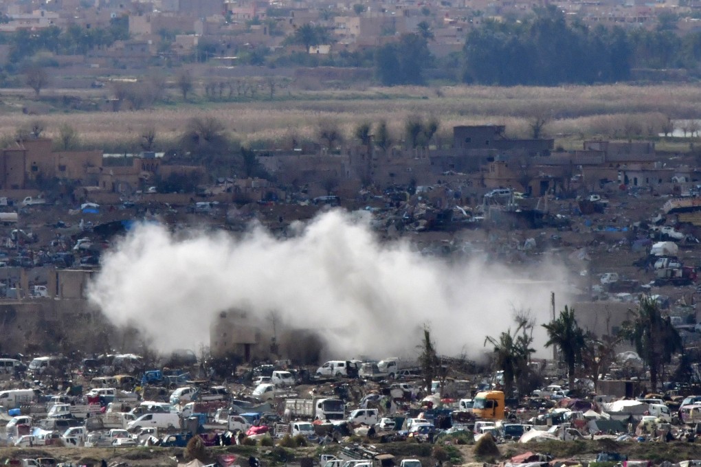 This photo taken on March 17 shows a view overlooking the camp of Baghouz where remaining Isis fighters had held out. More than two dozen Malaysians are holed up in refugee camps in northern Syria after the fall of Isis in March. Photo: AFP