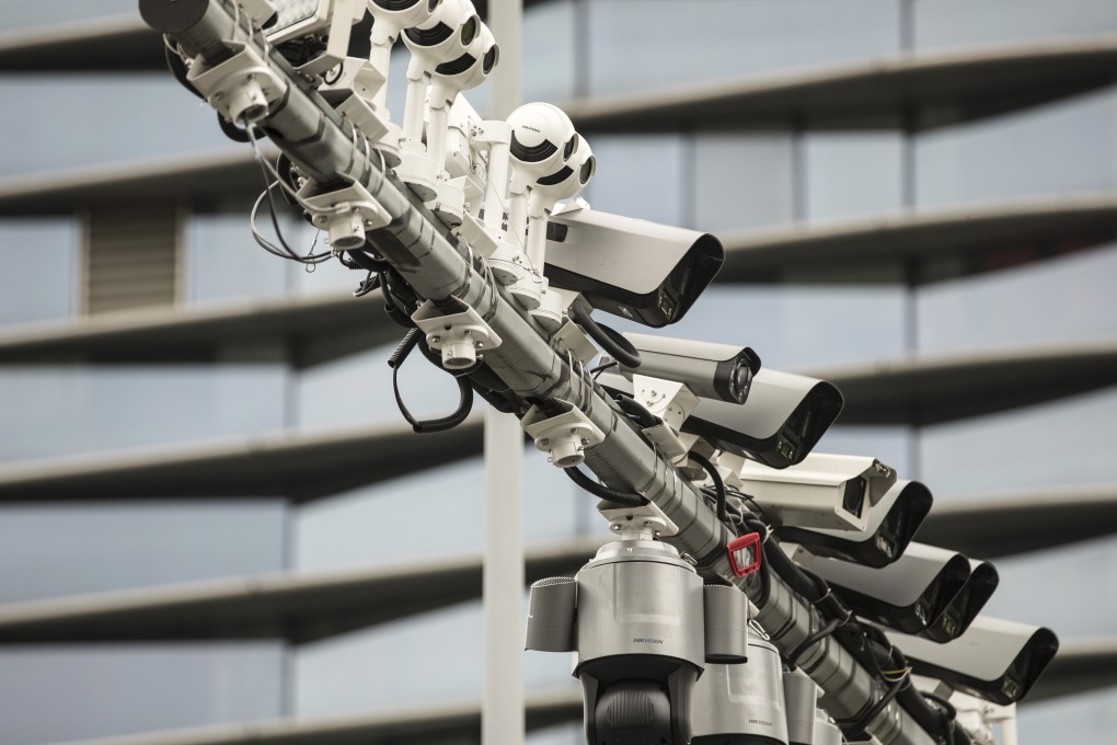 Surveillance cameras manufactured by Hikvision on a post at a testing station near the company’s headquarters in Hangzhou, China. Photo: Bloomberg
