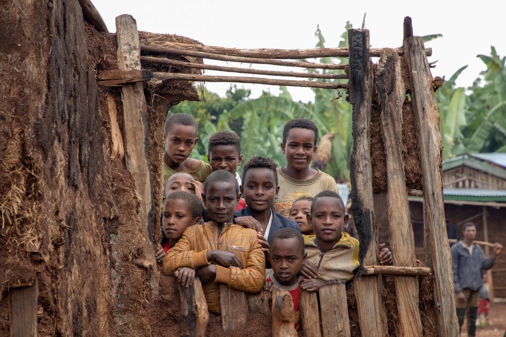Children in a burned shelter in Cherqo village, Southern Ethiopia. Photo: AFP