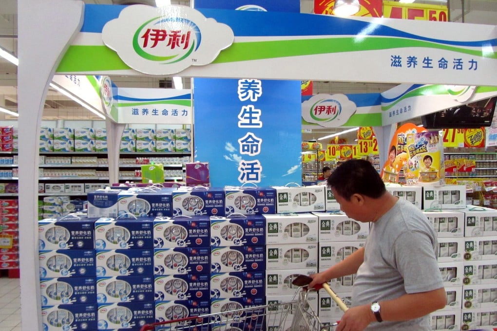 Yili milk products at a market in Shanghai. The company says rival Mengniu has infringed upon its interests by securing the status of joint global beverages sponsor of the Winter Olympics. Photo: Imaginechina