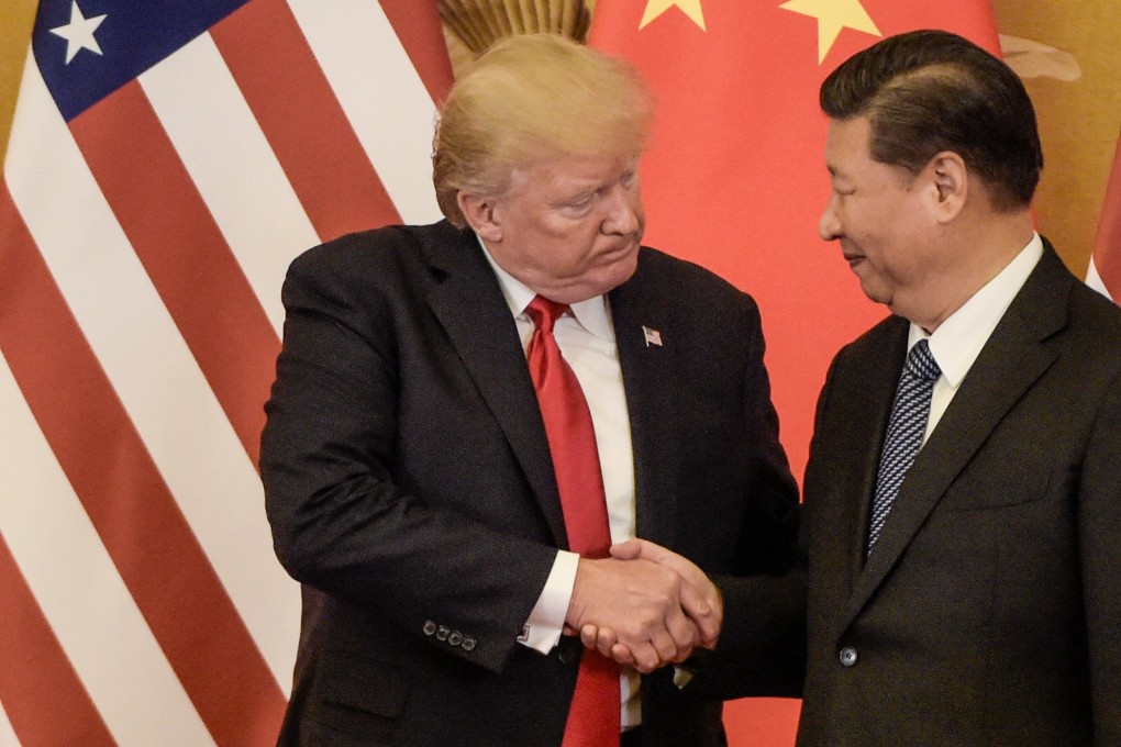 US President Donald Trump shakes hand with China's President Xi Jinping at the end of a press conference at the Great Hall of the People in Beijing in November 2017. Photo: AFP