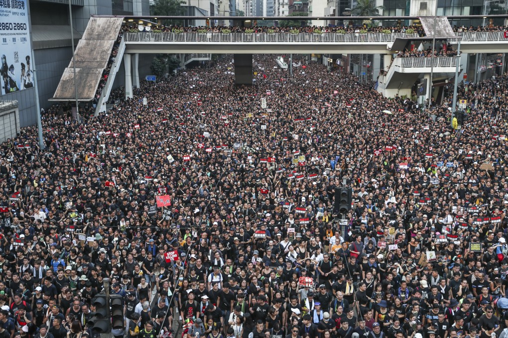 Protesters flood the streets of Hong Kong on Sunday in opposition to the government’s proposed extradition bill. Photo: Sam Tsang