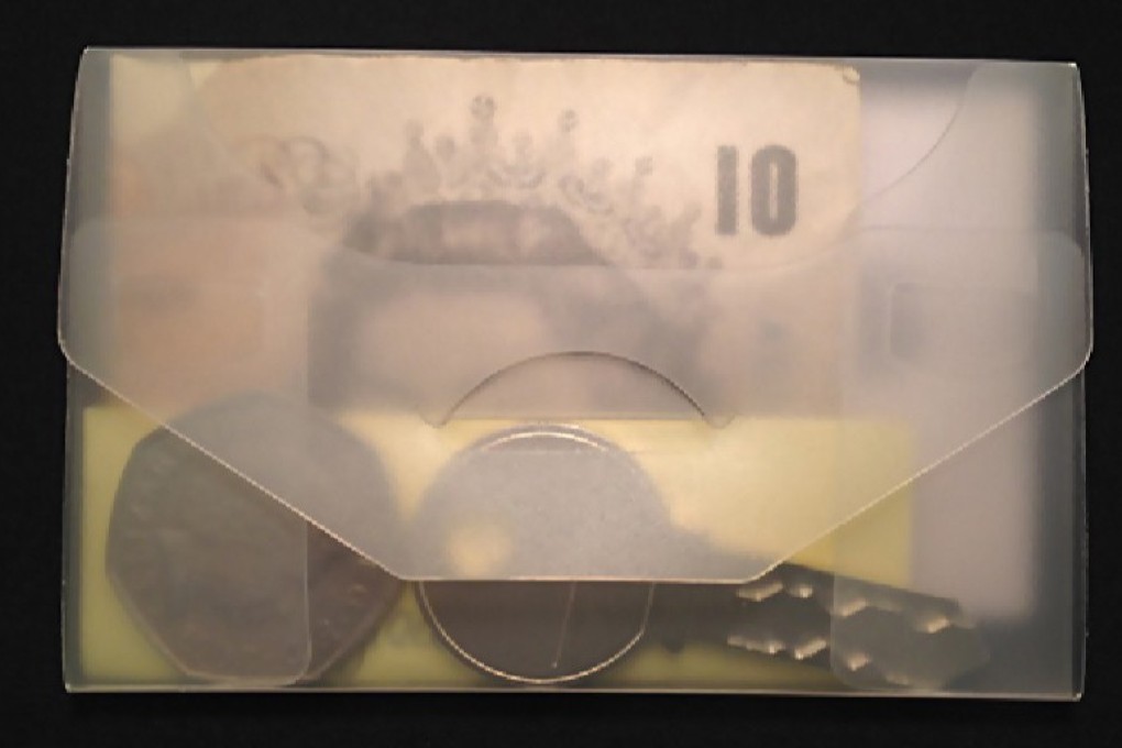 A sample wallet from the social experiment, which set out to measure how honest people are in 40 countries. Photo: Science