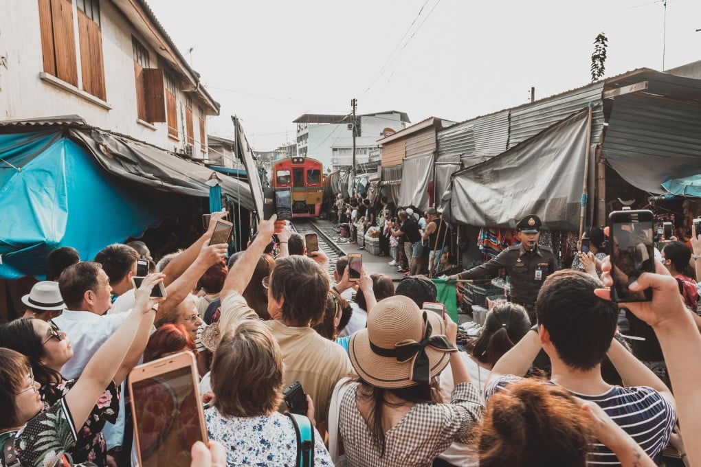 Tourists in Bangkok. Cities around the world are struggling to deal with overtourism and a new report lists 20 destinations that could be the next to suffer. Photo: Alamy