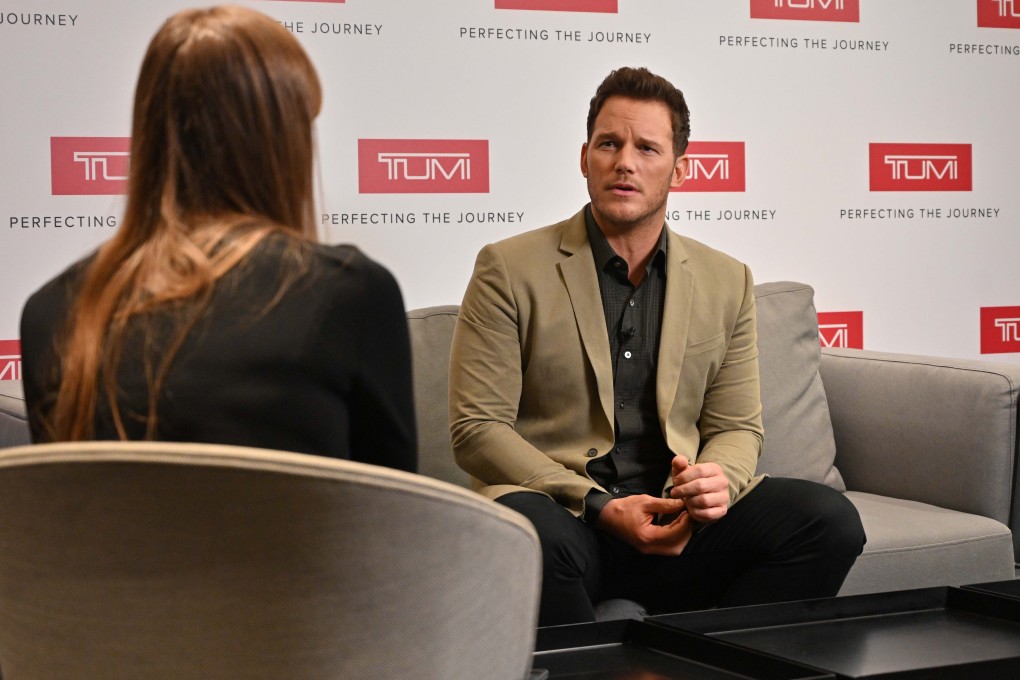 Chris Pratt talks to Post reporter Lauren James at a press conference where he was spokesperson for Tumi luggage.