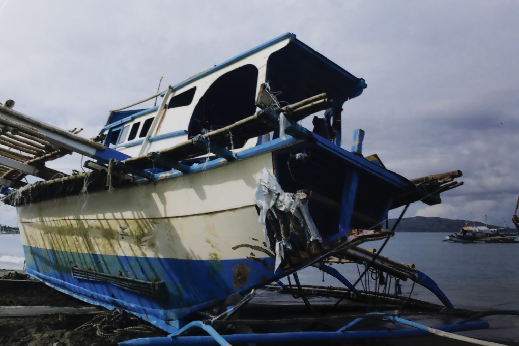 A handout photo showing shows the damaged Philippine fishing vessel after the collision. Photo: EPA