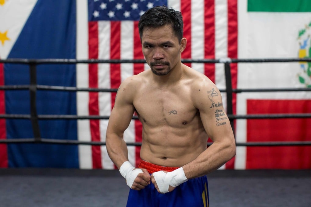 Veteran trainer Freddie Roach says Manny Pacquiao has rediscovered his aggressive streak as the countdown to his battle with welterweight champion Keith Thurman continues. Photo: AFP