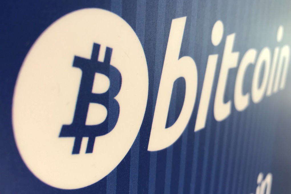 A bitcoin logo is seen on a cryptocurrency ATM in Santa Monica, California. Photo: Reuters