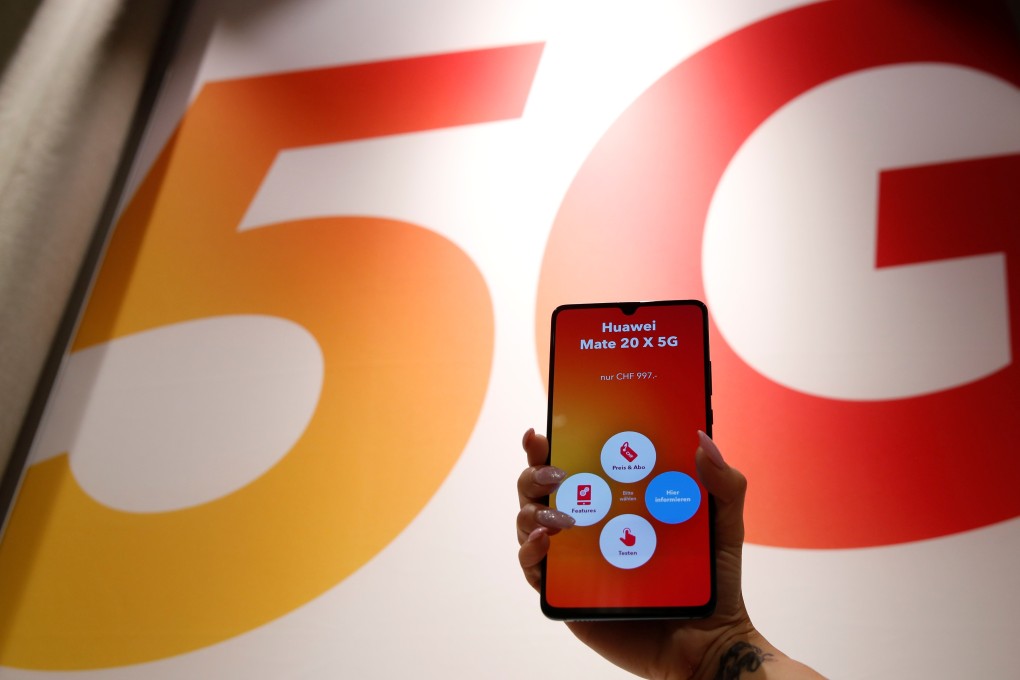 An employee displays a Huawei 5G Smartphone Mate 20X smartphone at a Sunrise telecommunications shop in Opfikon, Switzerland. Photo: Reuters