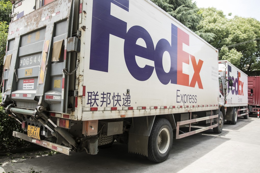 The FedEx Corp. logo is displayed on the side of trucks in Shanghai, China, on Sunday, June 2, 2019. Photo: Bloomberg