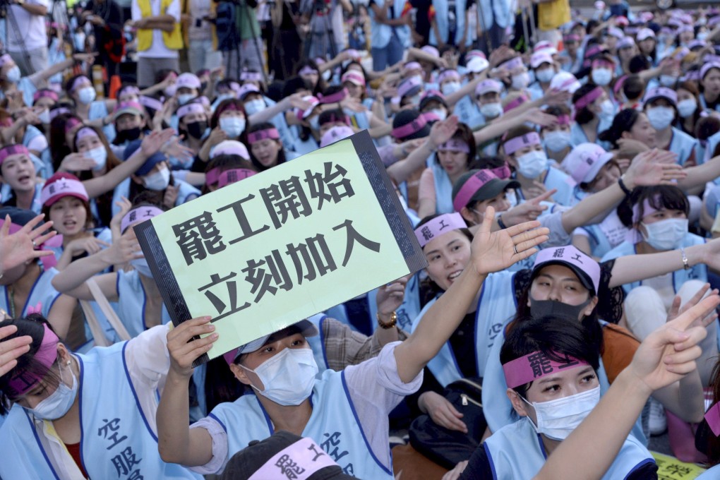 Striking EVA Air cabin crew at a protest outside the company headquarters on Friday. Photo: AP