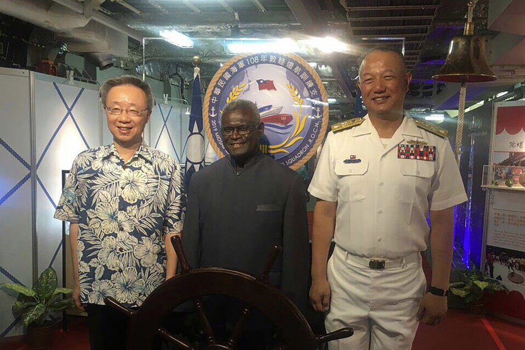Prime Minister Manasseh Damukana Sogavare (centre) welcomes a Taiwan naval ship to the Solomon Islands in May. The Pacific island nation is reviewing its diplomatic ties with Taiwan. Photo: CNA