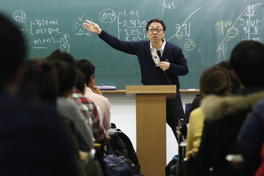A teacher gives a lecture at an academy in Seoul preparing applicants for entry exams to the civil service. Photo: Reuters