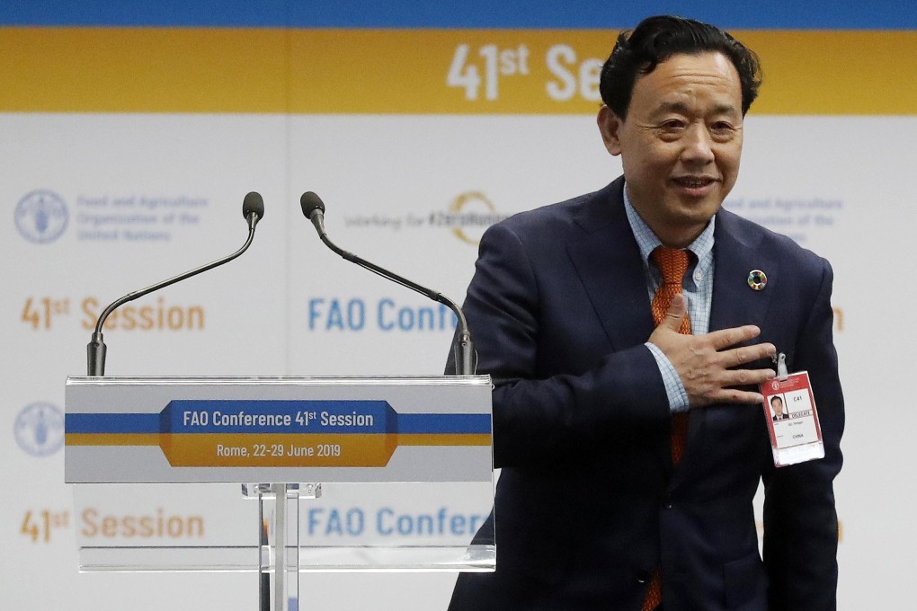 Qu Dongyu reacts after being appointed the new director general of the FAO in Rome on Sunday. Photo: EPA-EFE